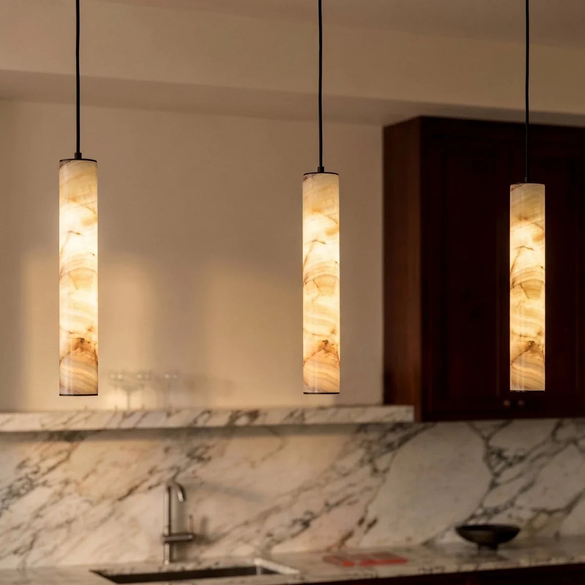 Sten Alabaster Pendant Light, styled above a dining table