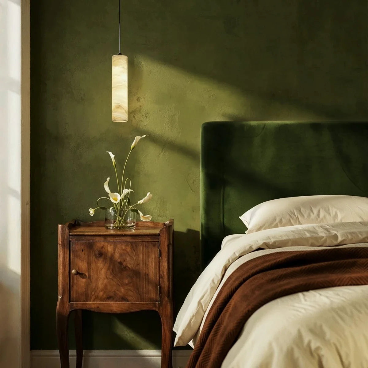 Sten Alabaster Pendant Light, angled view showing the silhouette