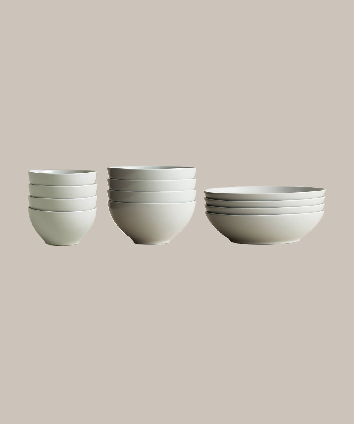 Stoneware Bowl Over Set, Fog, held in hand for scale