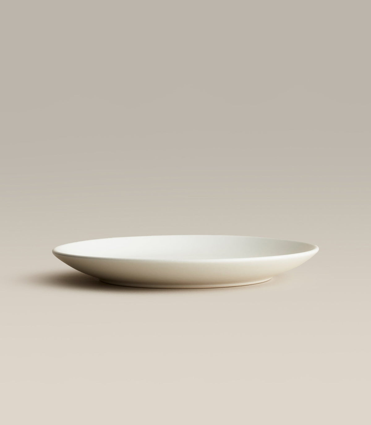 Stoneware Small Plate Set, Moon, a single piece shown on its own