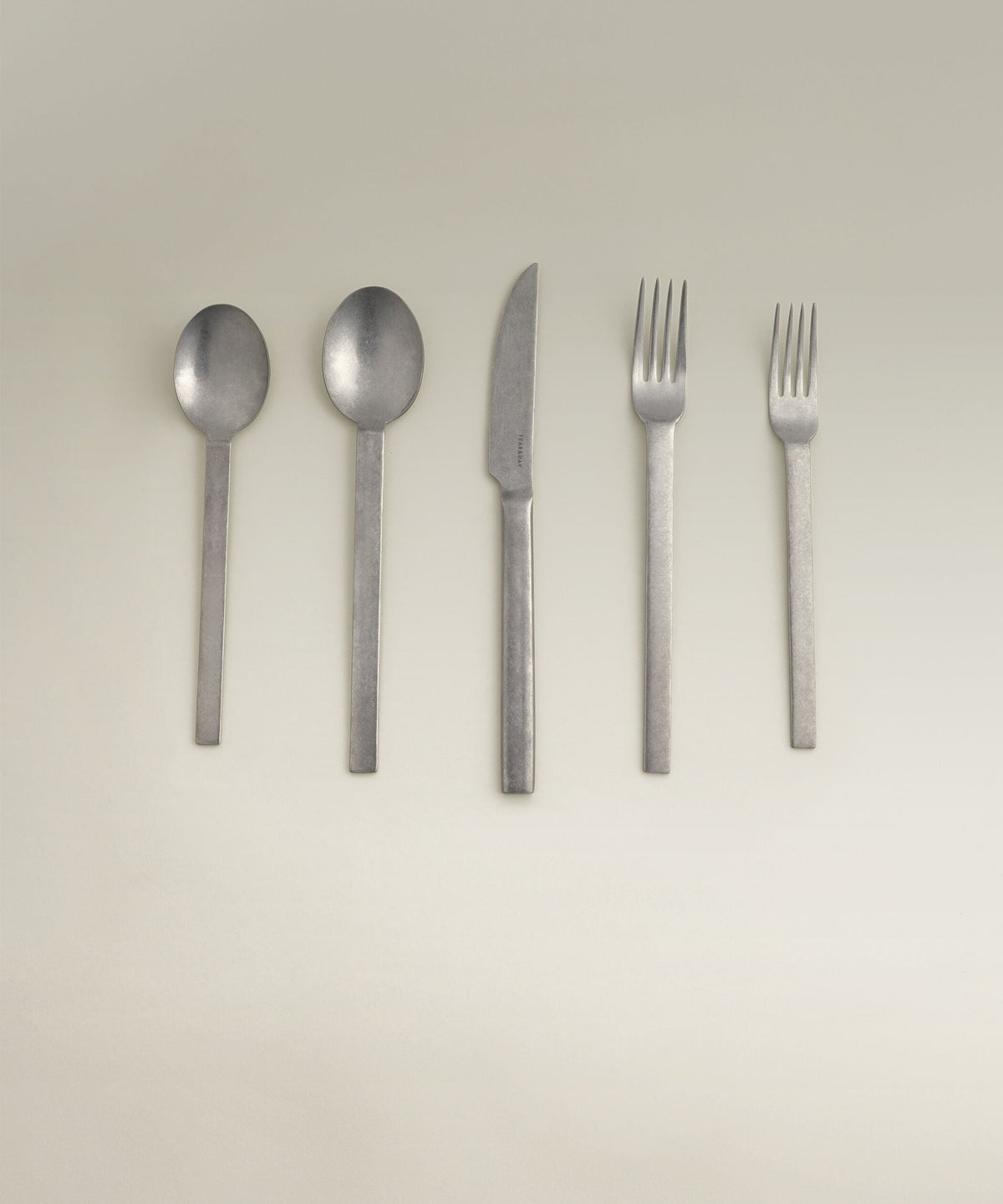 Tomales Four-Person Flatware Set, place setting in use