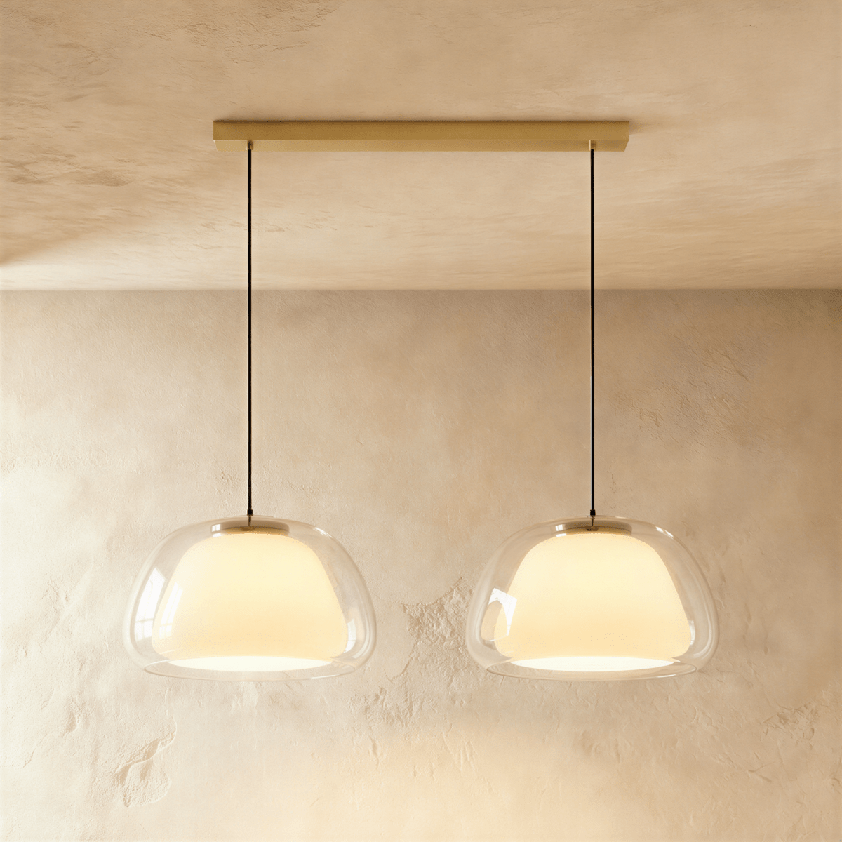 Zabda Metal Pendant Light, second lit and hanging in a styled room